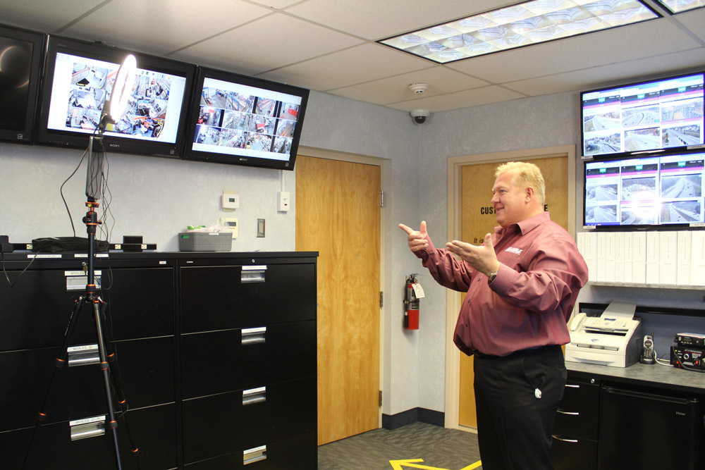 Norm Detrick, president of Reliable Snow Plowing Inc., monitors his fleet of Hitachi ZW80s in his company’s command center.