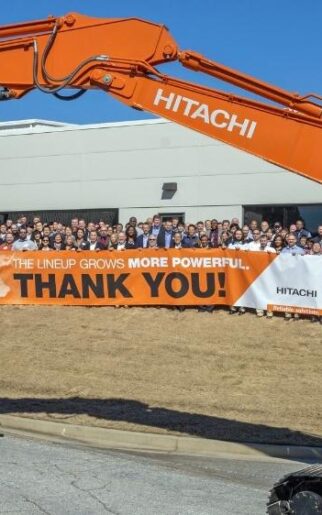 Hitachi machines with a "thank you" banner
